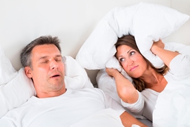 Angry Woman Trying To Sleep With Snoring Man